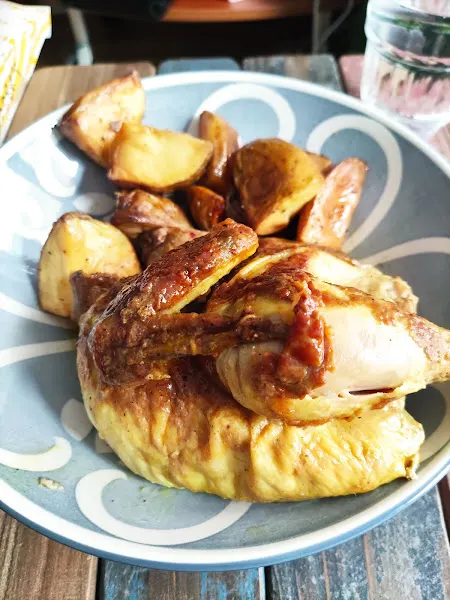 LA POLLERIA DE NOVICIADO Pollos asados al carbón - Madrid